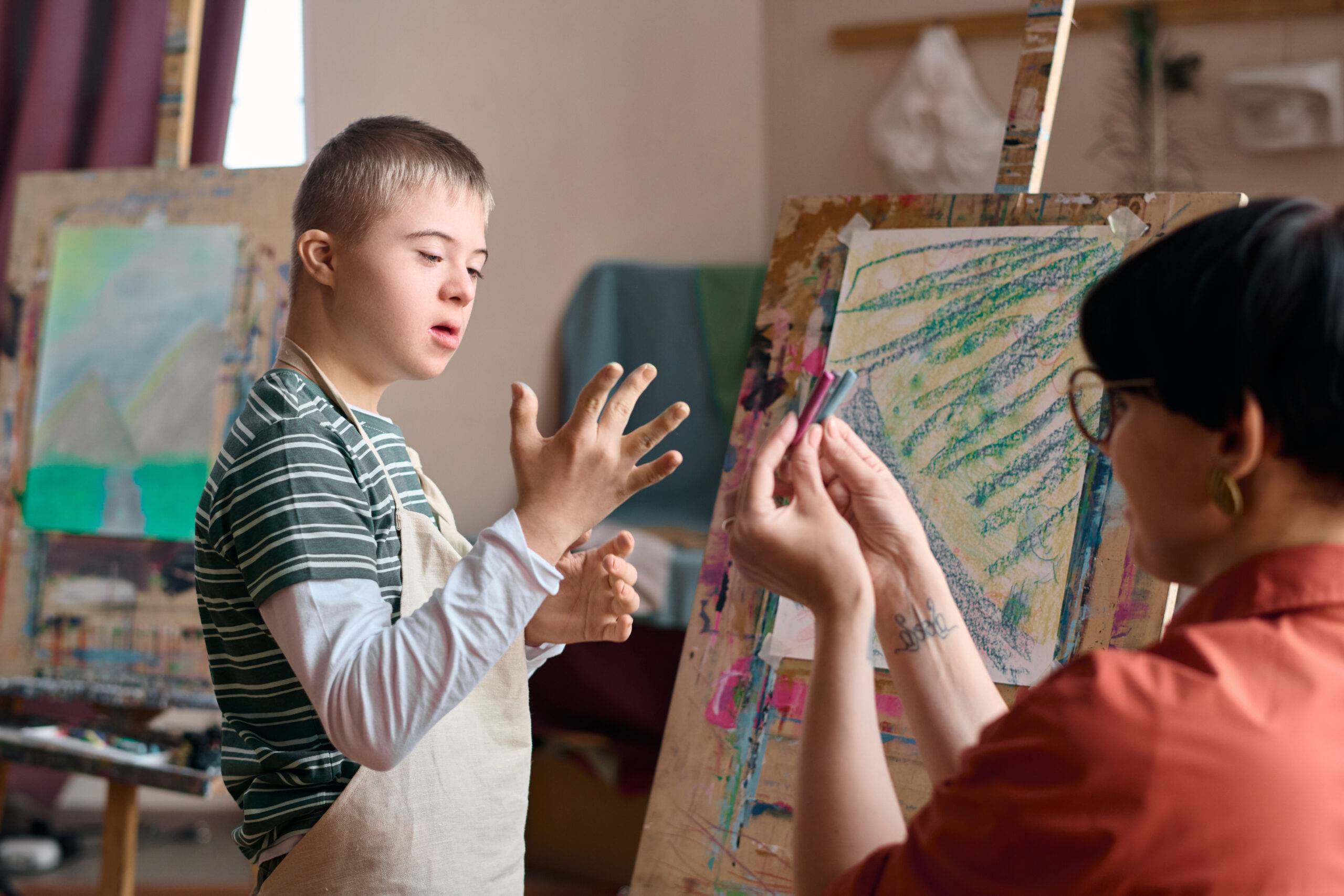 Boy with Down Syndrome Choosing Paint Colors boy with down syndrome choosing paint colors 2026 03 24 07 15 11 utc scaled