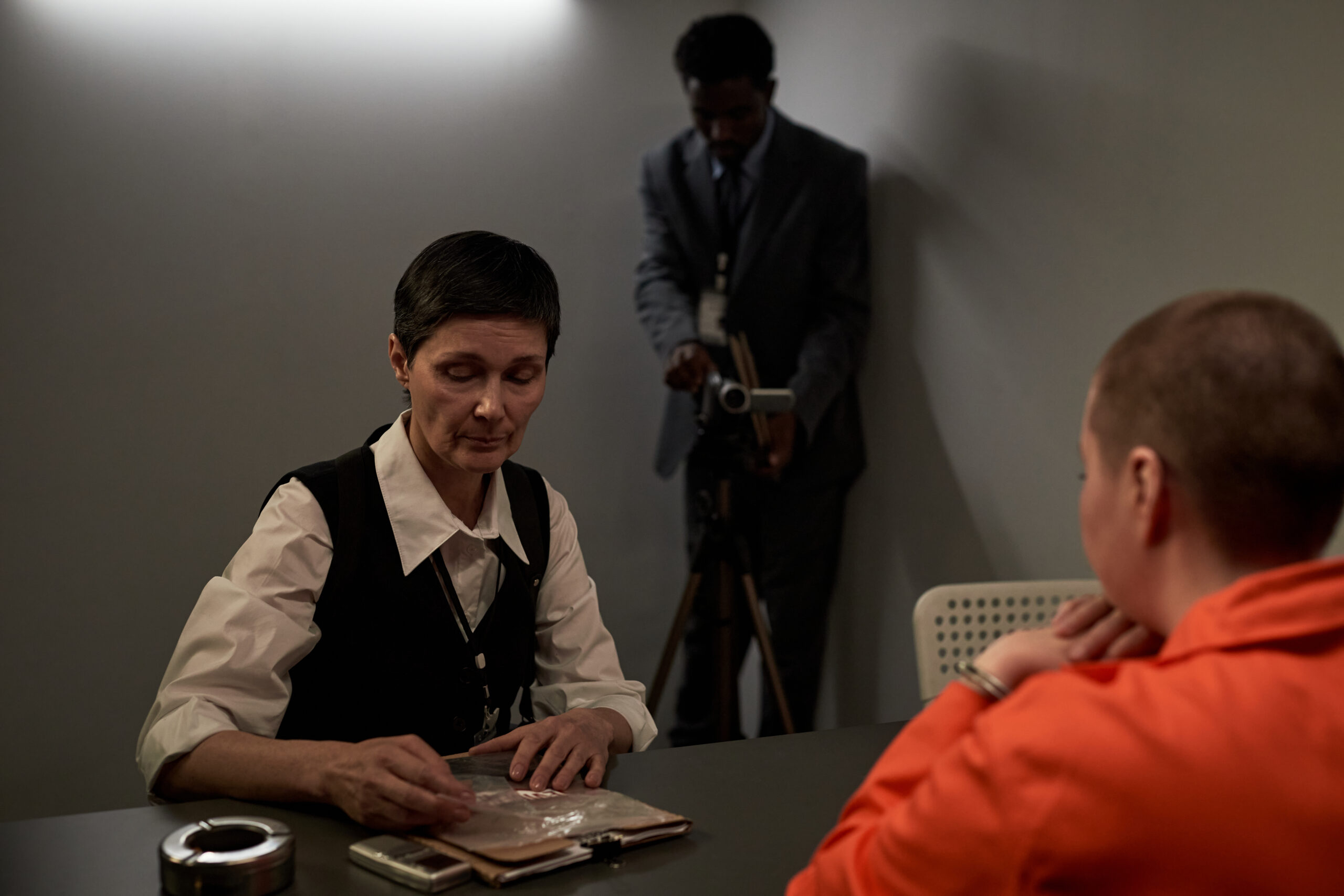 middle aged caucasian woman interrogating young ad 2026 03 20 04 00 19 utc scaled