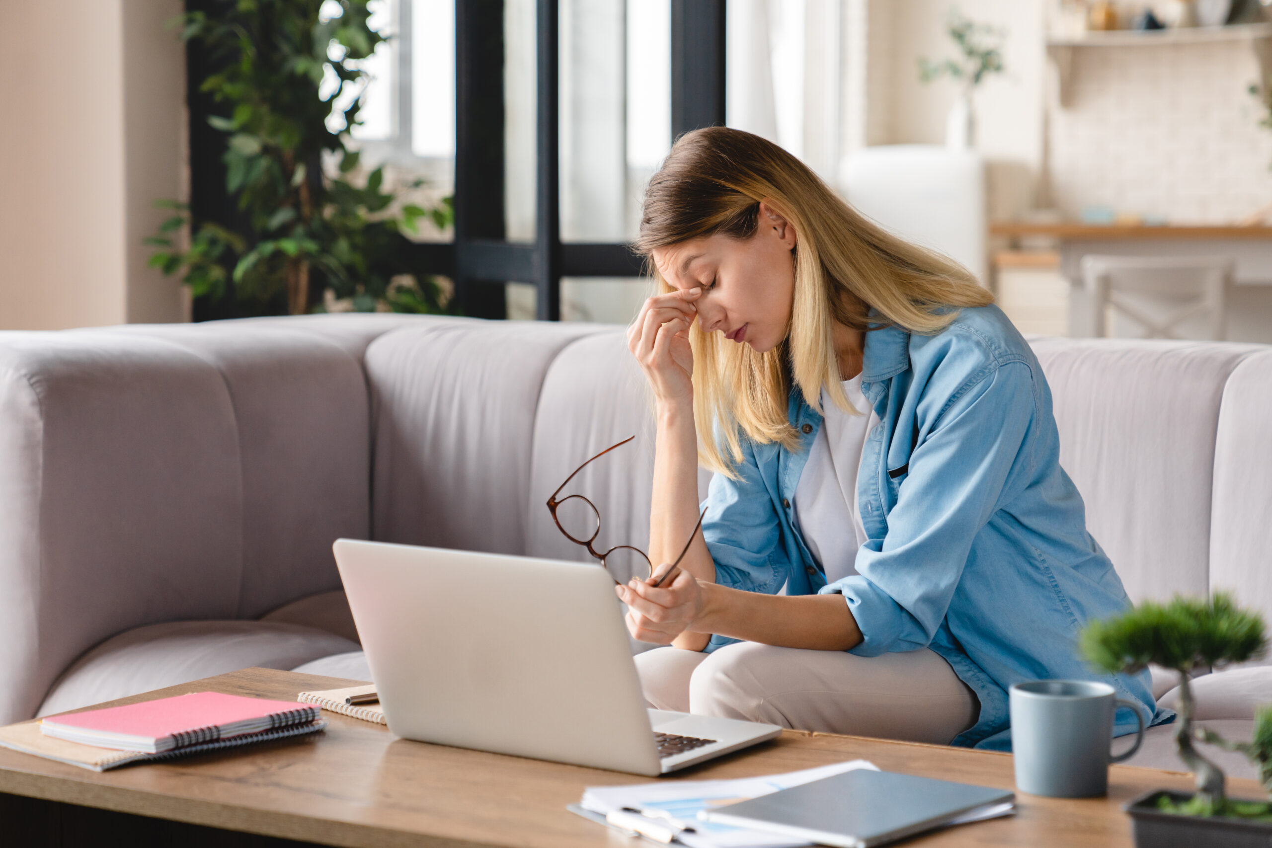 Tired exhausted stressed depressed young businesswoman student tutor teacher working at home stressed woman working from home with laptop 2026 09 23 02 26 45 utc scaled